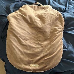 JJ Cole bundleme carseat blanket. Soft tan fur and cream sherpa inside